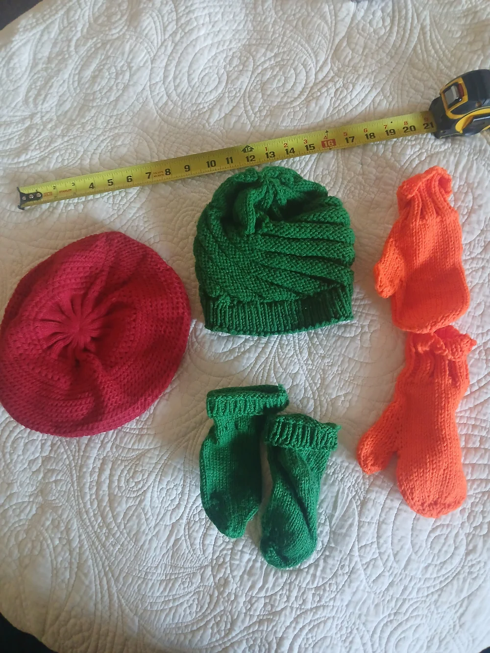 Various handknit toddler winter wear